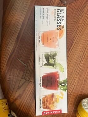 Kikkerland Clear Cocktail Glasses with Orange, Green, Red, Amber Prints